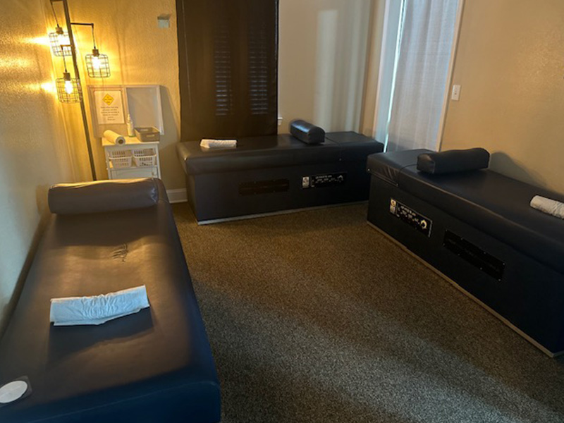 Chiropractic room with tables